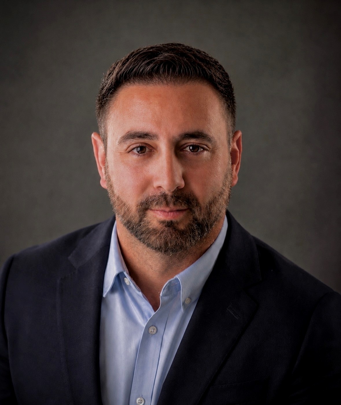Professional headshot of Adam Martin, CEO and co-founder of AllStream Services and Rental